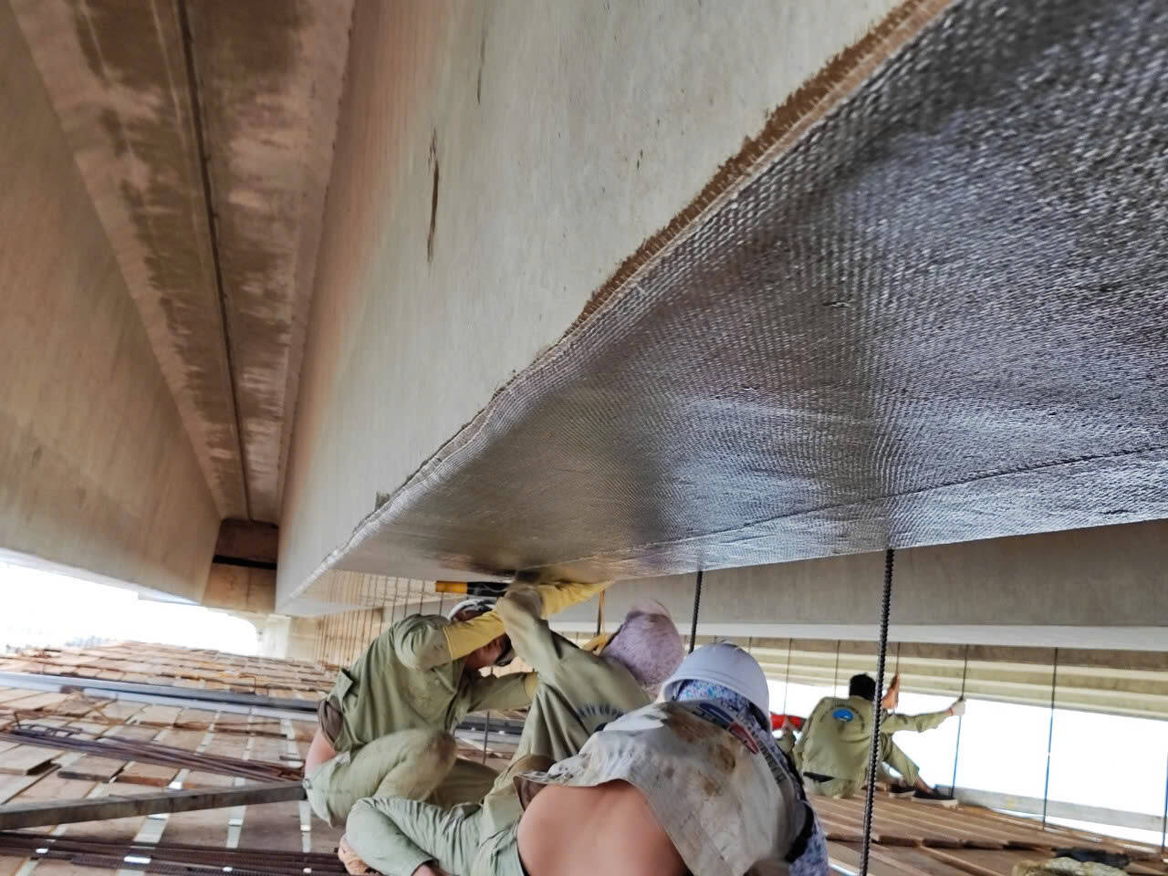 Repair Damaged Bridge Girder and Piers with Carbon Fiber Reinforced Polymer(CFRP)