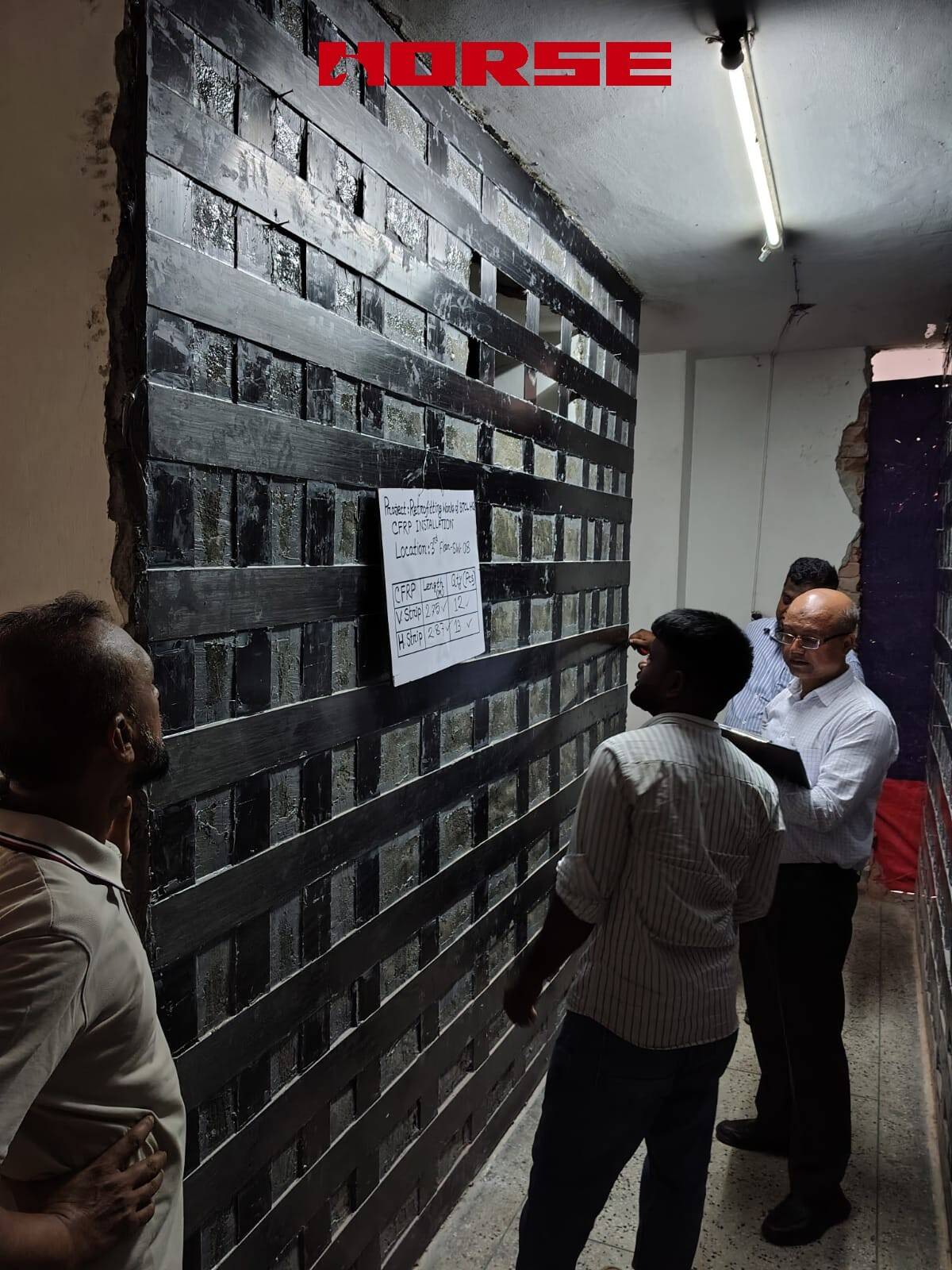 Retrofitting Concrete Walls Using CFRP Laminate Retrofitting Concrete Walls Using CFRP Laminate