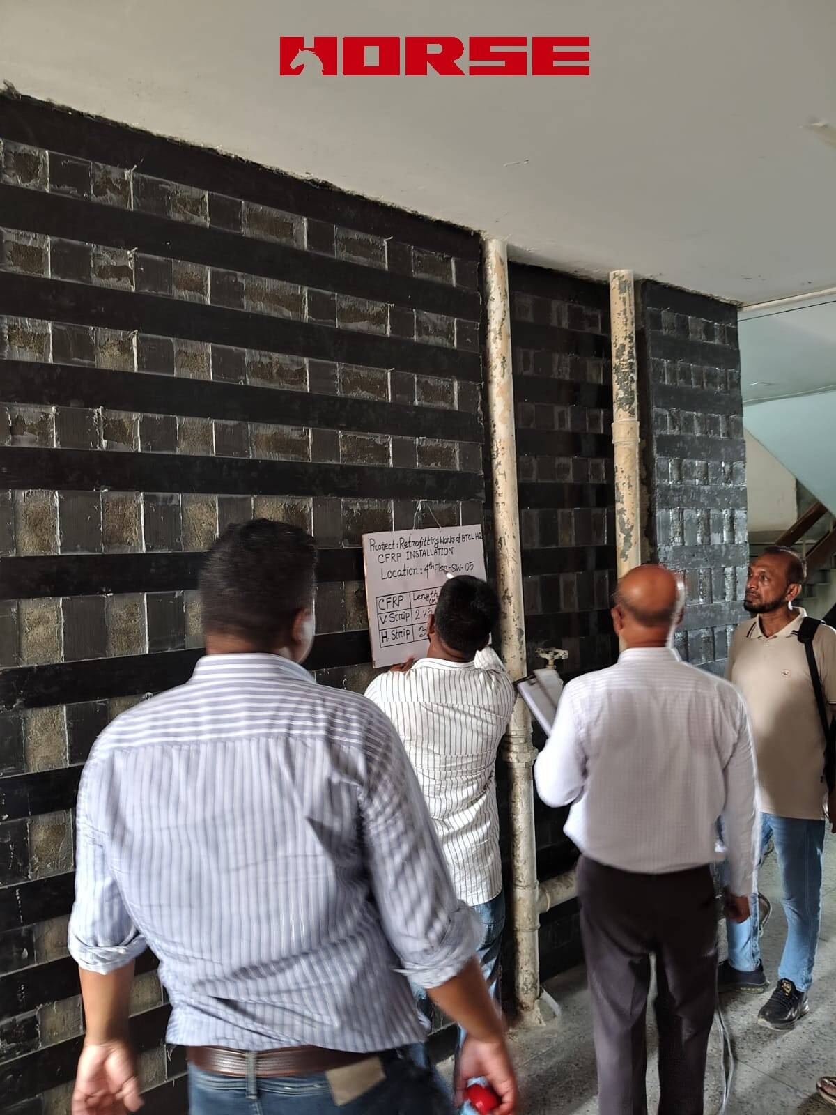 Retrofitting Concrete Walls Using CFRP Laminate Retrofitting Concrete Walls Using CFRP Laminate